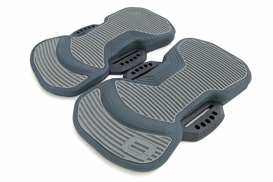 Ergonomic, shock absorbing footpads