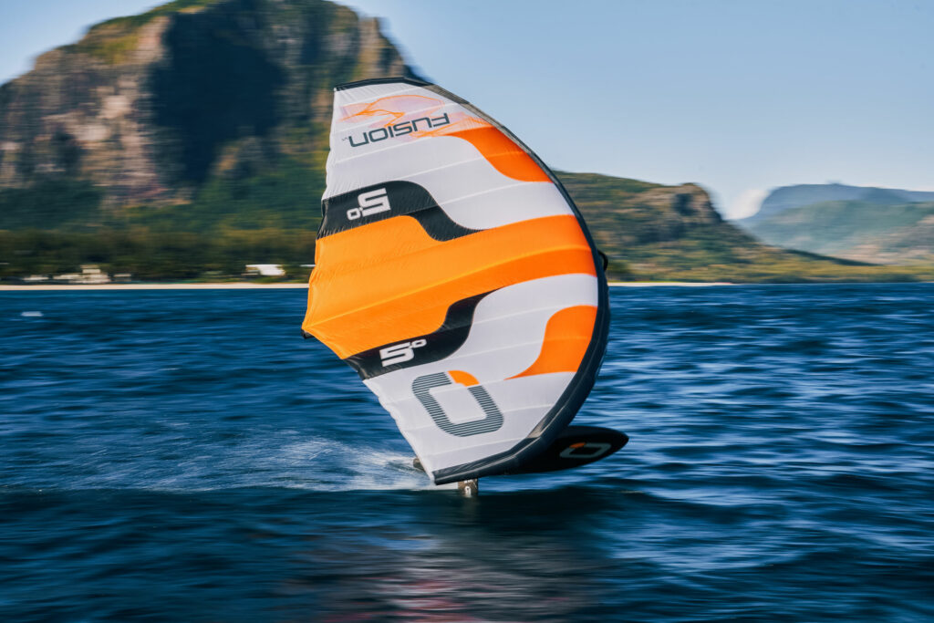 Fusion wing speeding across the water, ridden by co-designer Simon Burner, in Mauritius 